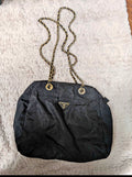 vintage Prada quilted nylon tote in black with gold tone chain and leather shoulder straps